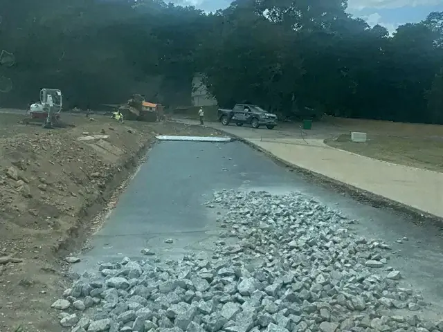 Fresh sealcoat spread over a stone surface